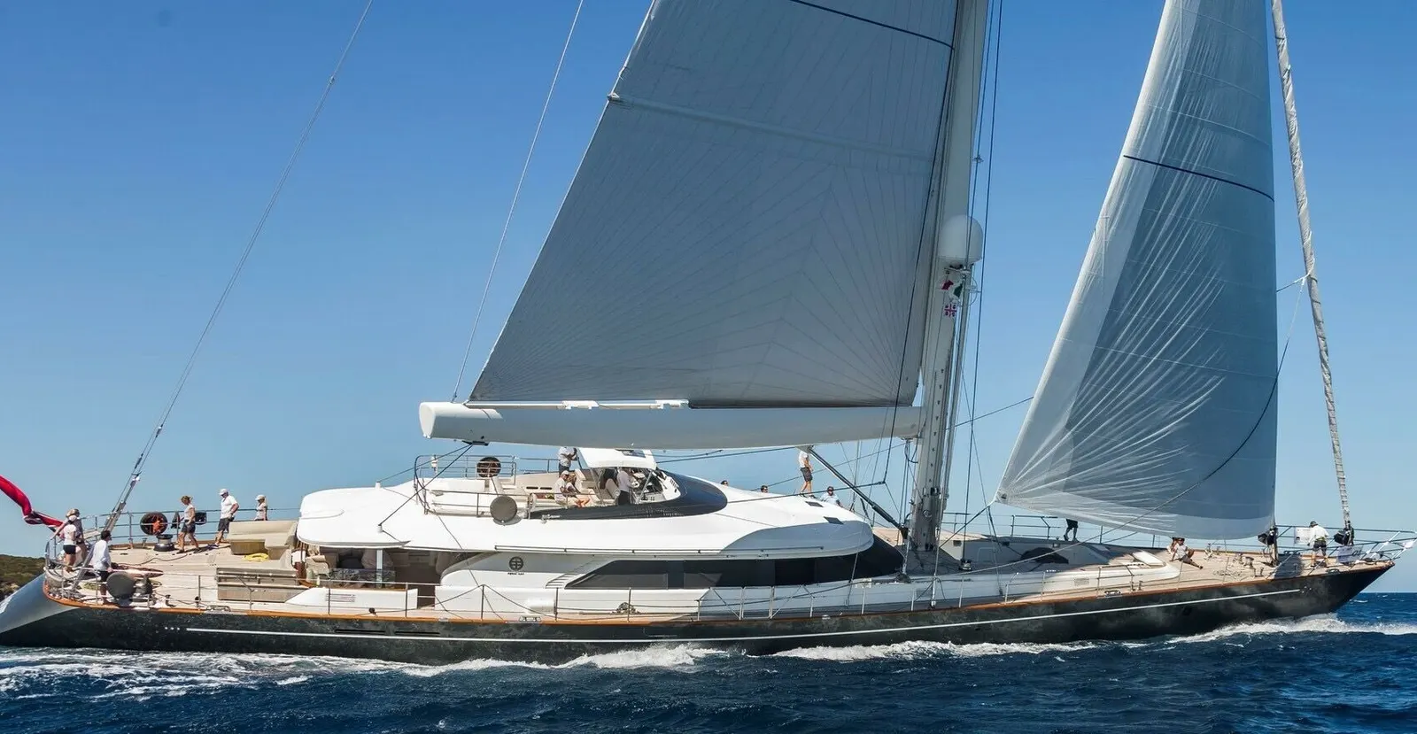 Serendipity I under full sail, cutting through the open sea